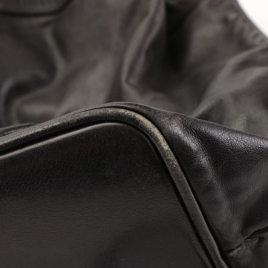 Chanel CC Drawstring Sling Backpack