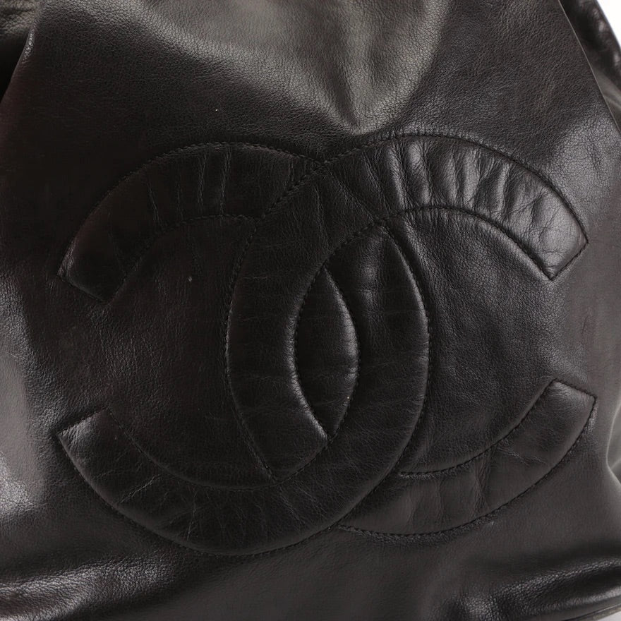 Chanel CC Drawstring Sling Backpack Bag in Black Lambskin Leather